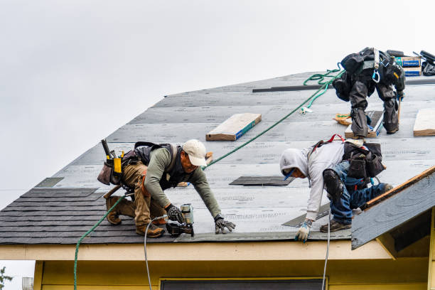 Professional Roofing technician working in South Jamesport, NY